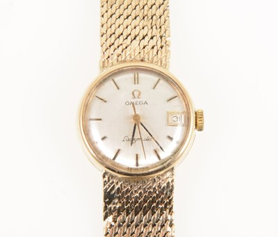 Lot 1388 - Omega - a lady's 9 carat yellow gold Ladymatic wrist watch.