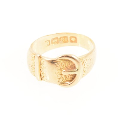 Lot 1282 - An 18 carat yellow gold buckle ring.