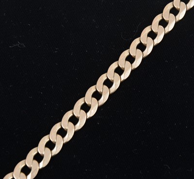 Lot 1308 - A 9 carat yellow gold flat curb link bracelet.