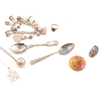 Lot 1392 - A collection of silver jewellery, charm bracelet, ingot, pendants, rings, two EPNS spoons etc