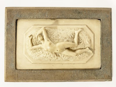 Lot 210 - A composite decorative plaque with reclining female nude by Joe Descomps