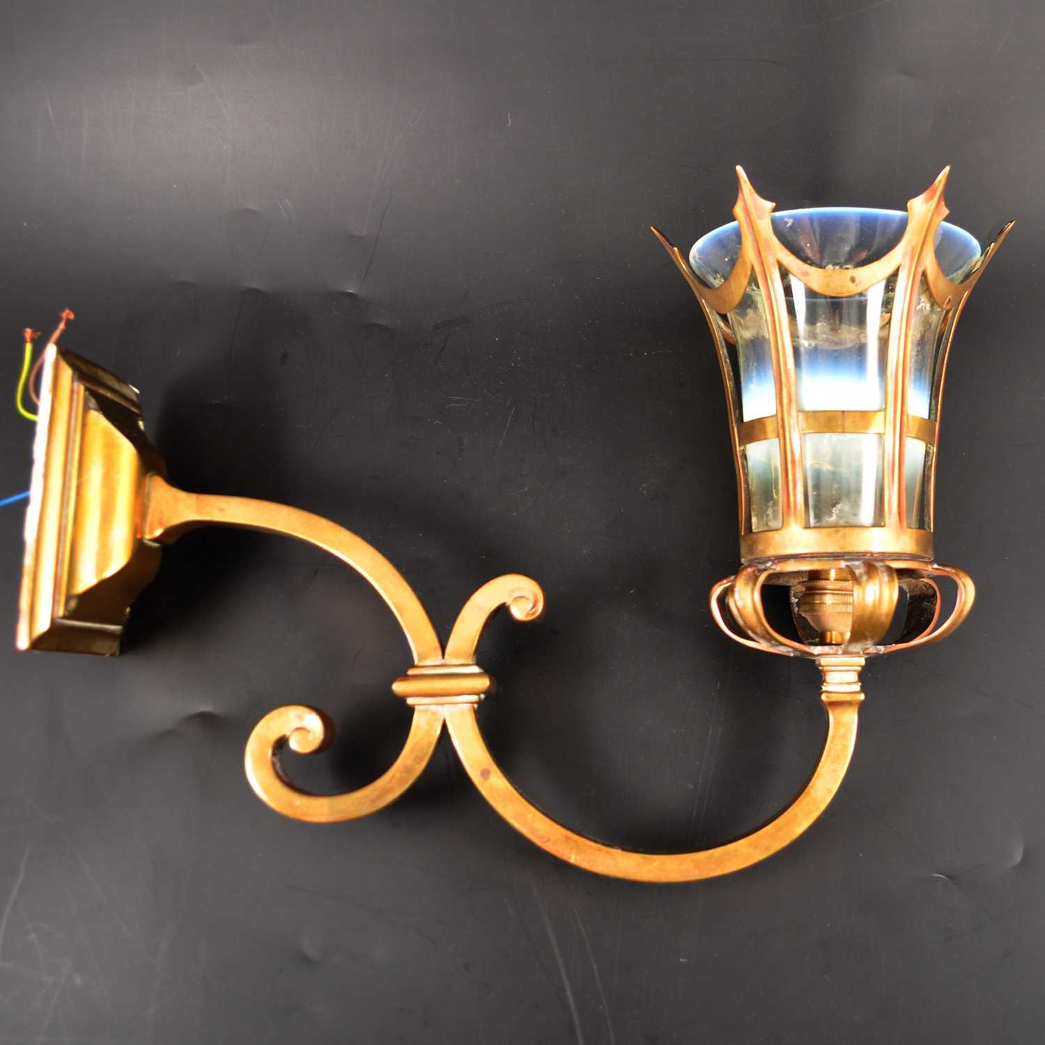 Lot 519 - An English Edwardian brass and opalescent glass wall light