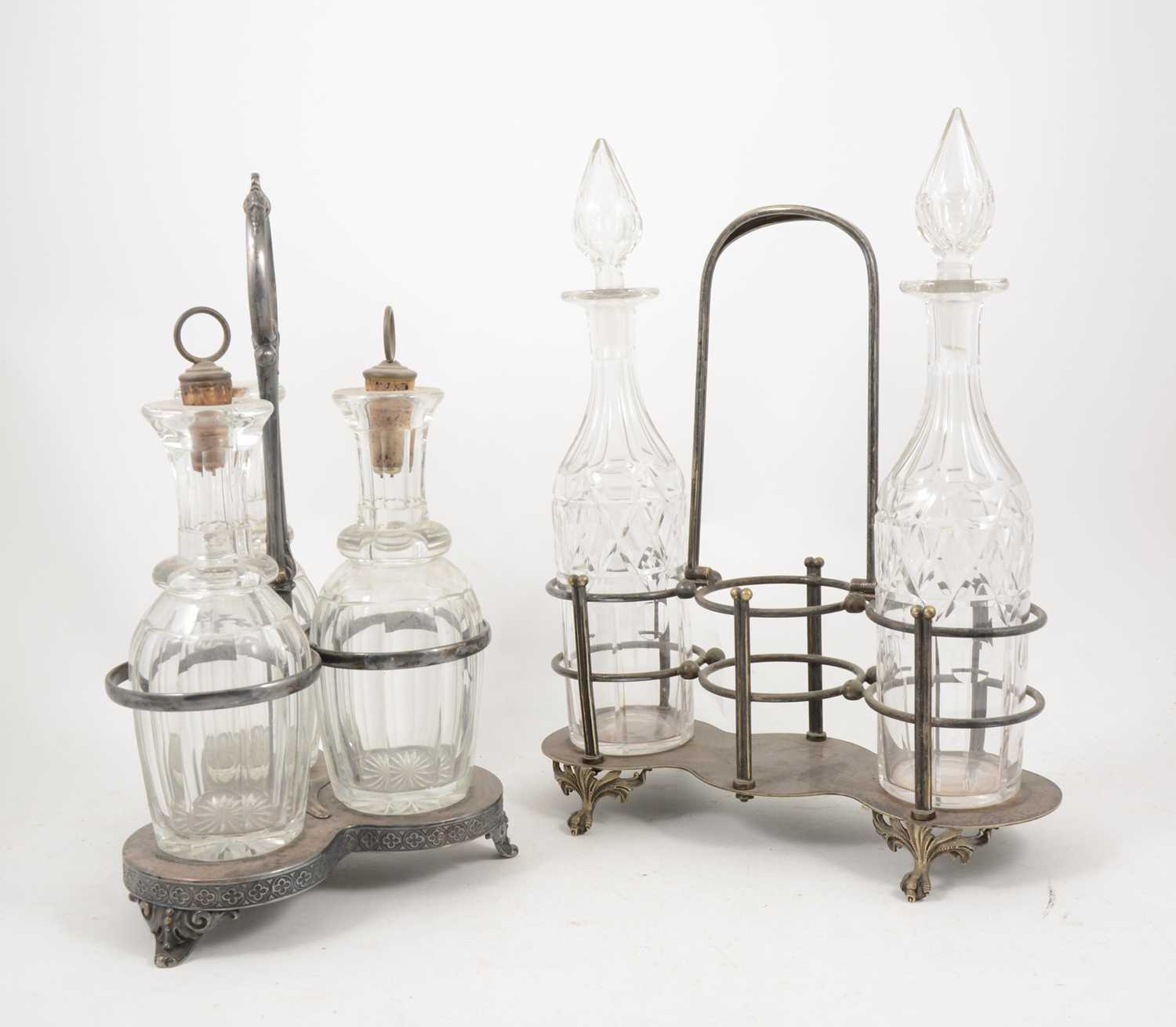 Lot 1077 - Silver plated three bottle tantalus