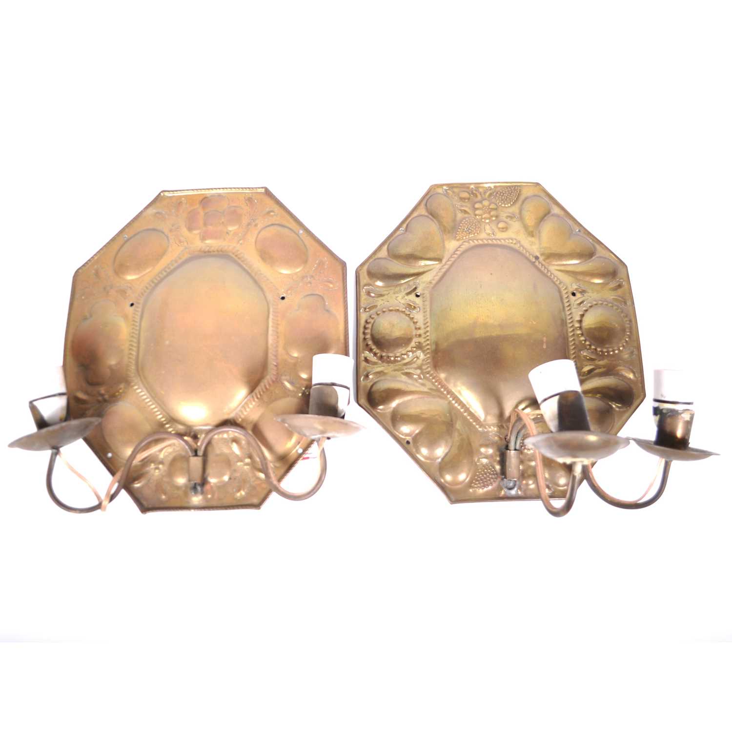 Lot 518 - Two similar Arts and Crafts brass wall sconces