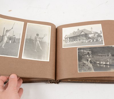 Lot 1129 - An album of photographic postcards