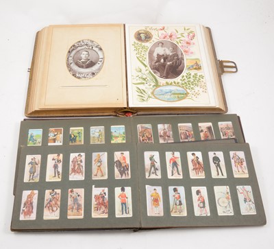 Lot 1134 - A Victorian leather bound photograph album