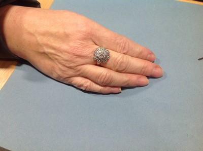 Lot 202 - A diamond cluster cocktail ring.