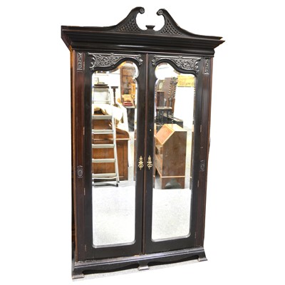 Lot 512 - A late Victorian carved mahogany wardrobe.