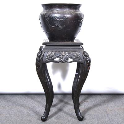 Lot 450 - Japanese bronze jardinière on carved wooden stand, late 19th century.