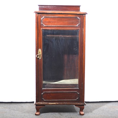 Lot 459 - A walnut music cabinet.