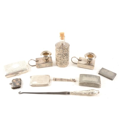 Lot 323 - A collection of silver and silver-plated items, to include cigarette cases, Albert chains, cigar piercer etc.