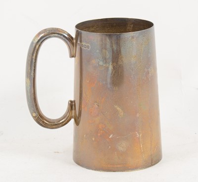 Lot 1183 - A plain silver tankard by Walker & Hall, Sheffield 1944.