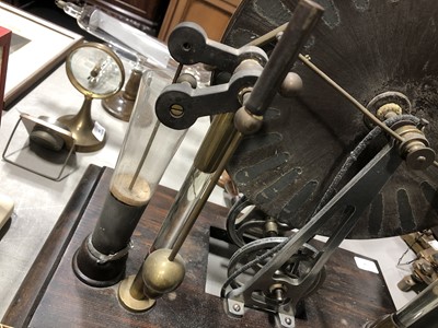 Lot 238 - A Wimshurst Influence electrostatic machine, stained pine platform, width 47cm.