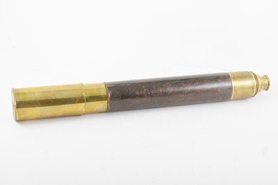 Lot 237 - A brass and leather sleeved telescope