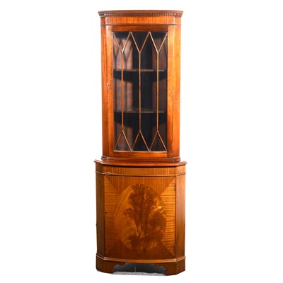 Lot 143 - A reproduction yew wood bookcase and a reproduction mahogany finish freestanding corner cupboard