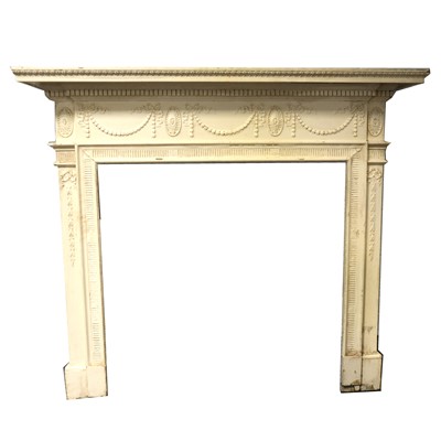 Lot 521 - An Edwardian painted pine fire surround, in the Adam style