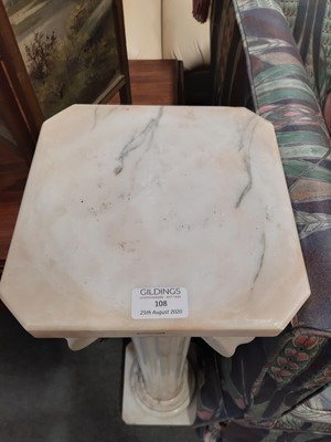 Lot 108 - A variegated marble Ionic column