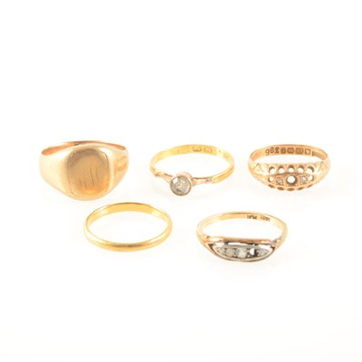 Lot 356 - Two 22 carat yellow gold rings, two 18 carat yellow gold rings and one other ring