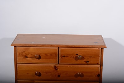 Lot 83 - A modern pine chest of drawers