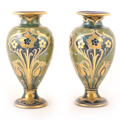 Lot 544 - William Moorcroft for James Macintyre, a pair of 'Green and Gold' Florian Ware vases