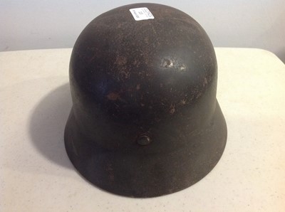 Lot 113 - WWII German steel war helmet with side decals.