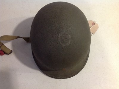 Lot 114 - WWII American war helmet