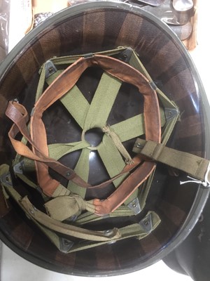 Lot 114 - WWII American war helmet