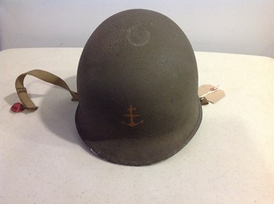 Lot 114 - WWII American war helmet