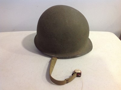 Lot 114 - WWII American war helmet