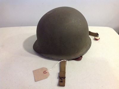 Lot 114 - WWII American war helmet