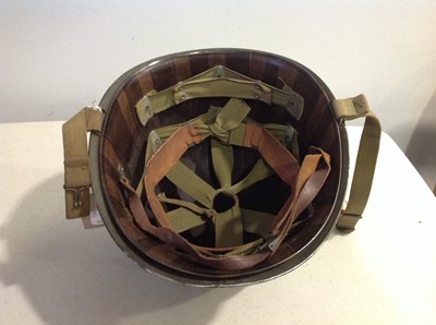 Lot 114 - WWII American war helmet