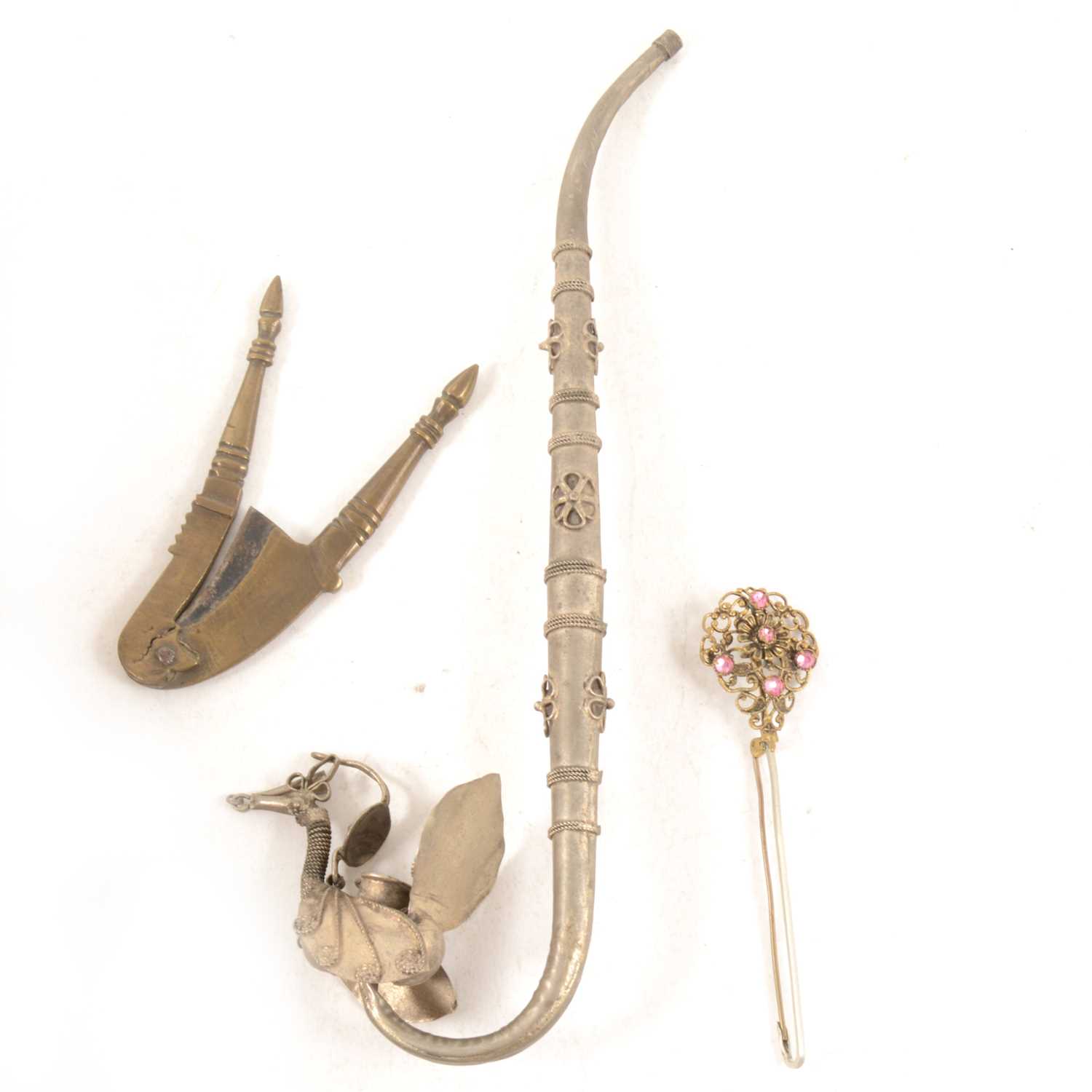 Lot 121 - 19th Century Indian Opium pipe in the form of a Peacock, a brass betelnut cutter and a pin brooch.