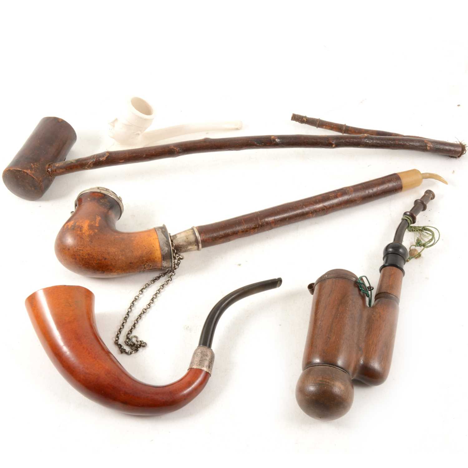 Lot 122 - Calabash pipe and three other 19th Century pipes and a clay pipe.