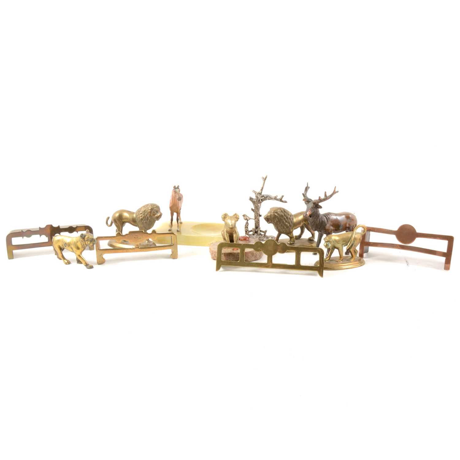 Lot 124 - Four 19th Century miniature brass fenders together with various metal animals etc.