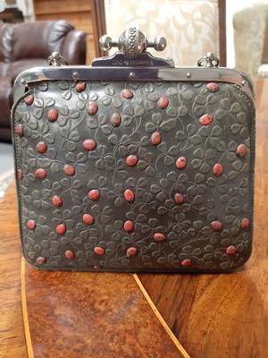 Lot 125 - Edwardian tooled leather dance purse with Ladybird and leaf decoration and a leather coin purse.
