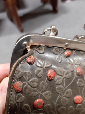 Lot 125 - Edwardian tooled leather dance purse with Ladybird and leaf decoration and a leather coin purse.