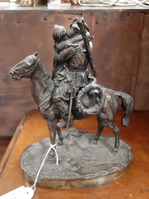 Lot 131 - A bronze group of a mounted Russian Cossack kissing his sweetheart