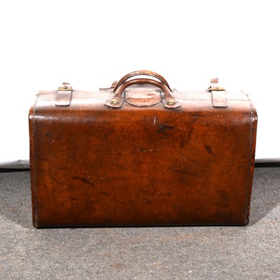 Lot 229 - A vintage leather suitcase