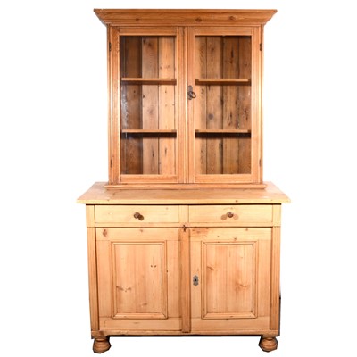 Lot 621 - A matched pine bookcase