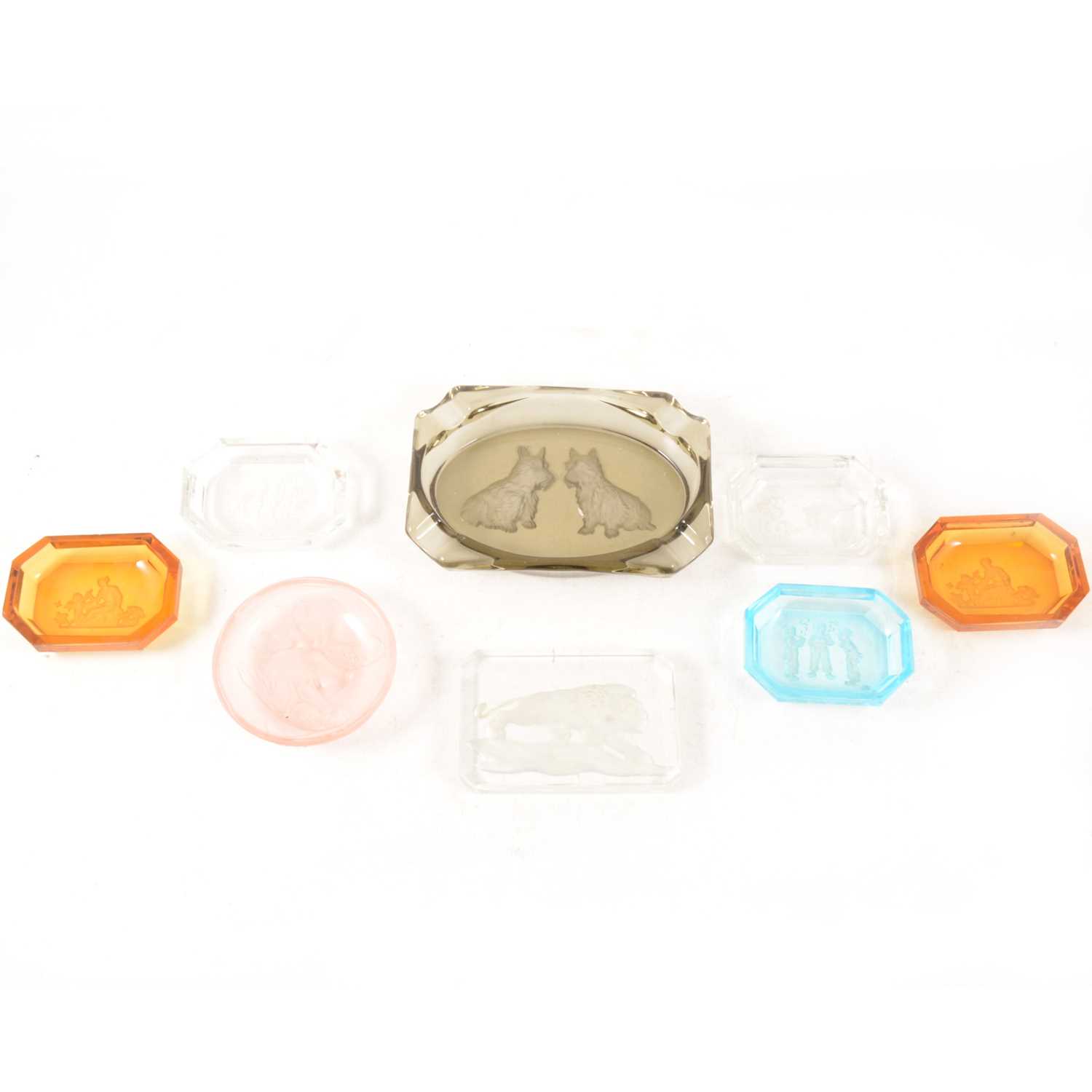 Lot 71 - A collection of glass dishes intaglio moulded in the style of Baccarat.