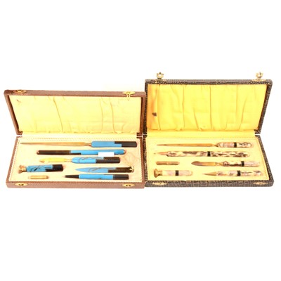 Lot 182 - Two Art Deco Bakelite and gilt metal writing sets.