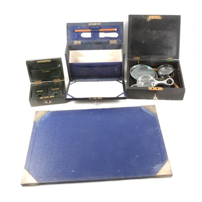 Lot 220 - Stationery items - vintage painted letter rack, writing cases, magnifying glasses, glass pen trays.