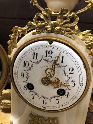 Lot 147 - A Louis XV style white marble and gilt metal three-piece clock garniture
