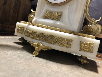 Lot 147 - A Louis XV style white marble and gilt metal three-piece clock garniture