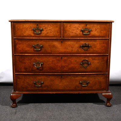 Lot 523 - A walnut chest of drawers, fitted with two...