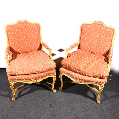 Lot 517 - A pair of Louis XV style painted beech bergere chairs