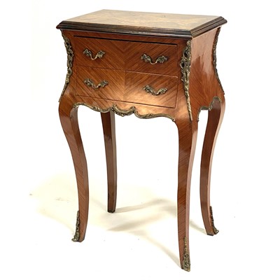 Lot 320 - A Louis Phillipe style kingwood and marquetry table en chiffonier, late 20th Century