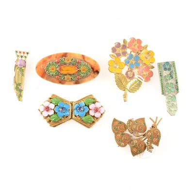 Lot 380 - A collection of vintage enamel dress clips and brooches.