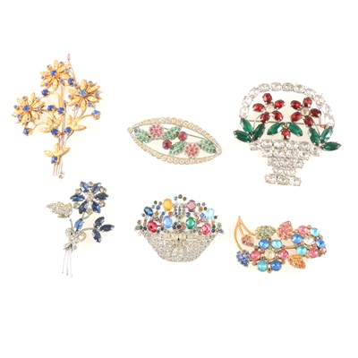 Lot 385 - A collection of vintage coloured floral design paste brooches.