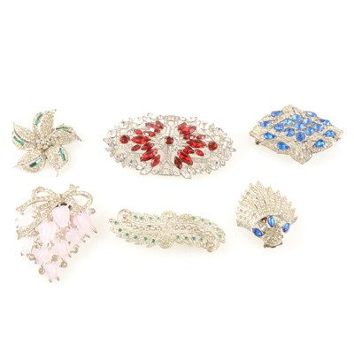 Lot 384 - A collection of vintage paste set brooches and clips.